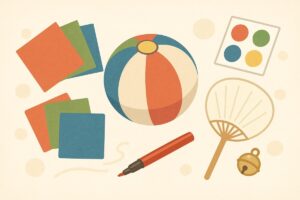 折り紙や和紙、シールなど紙風船遊びに使う道具が並んだイラスト