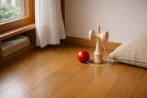床に置かれた昔ながらのけん玉