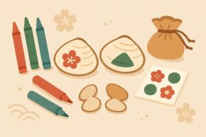 貝合わせに必要な材料（貝殻・ペン・シール）が並んだ説明イラスト